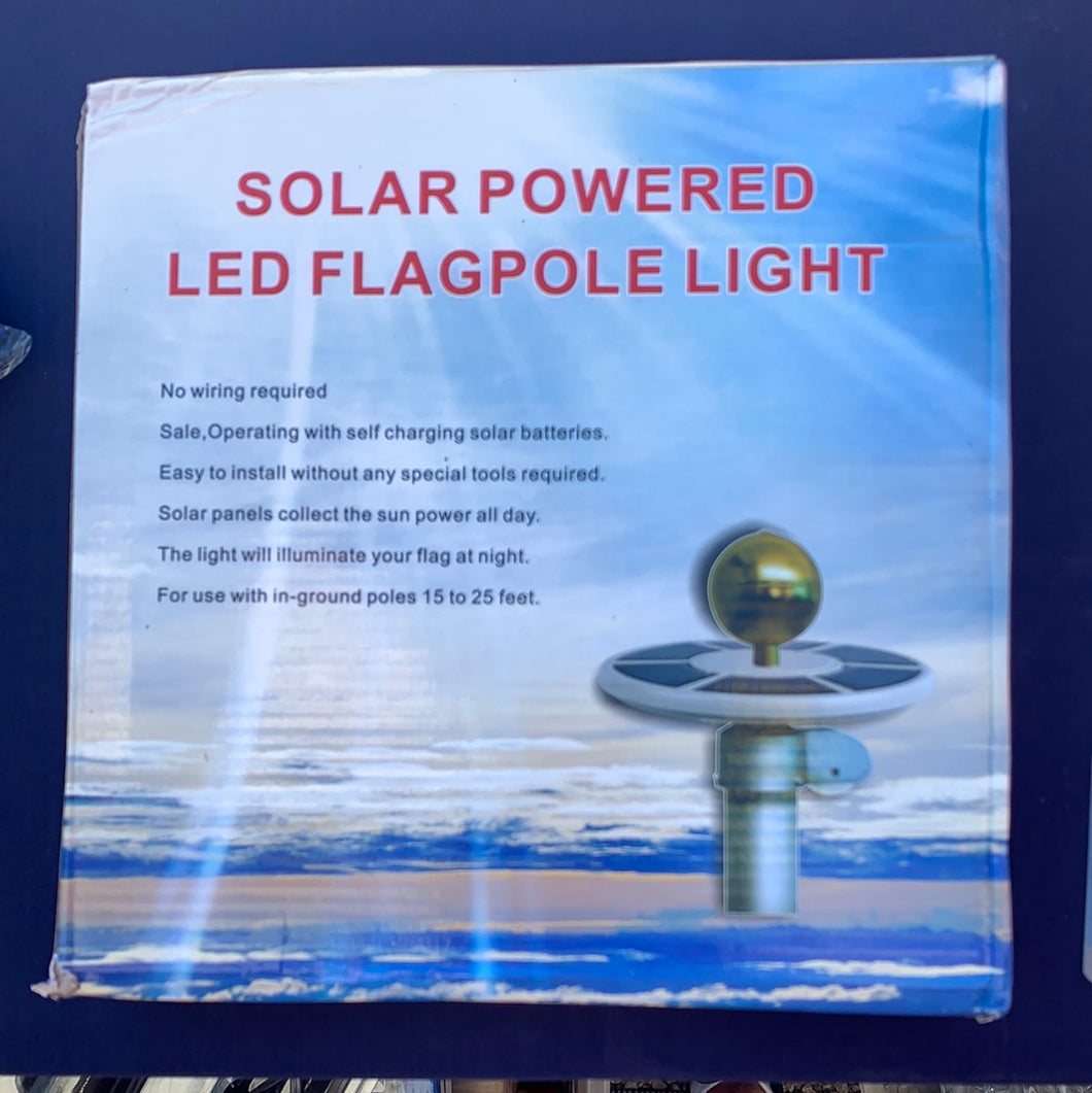 Solar powered LED flagpole light